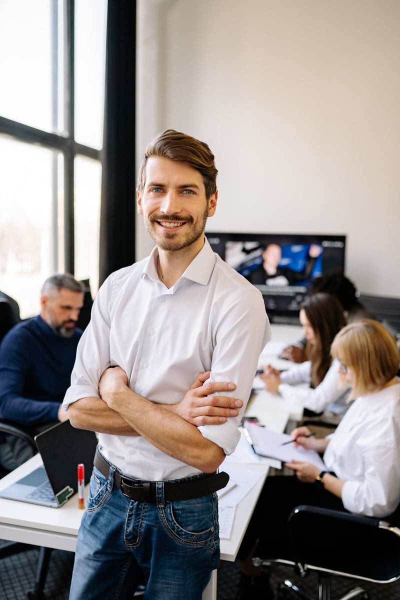 A Man Standing in an Office